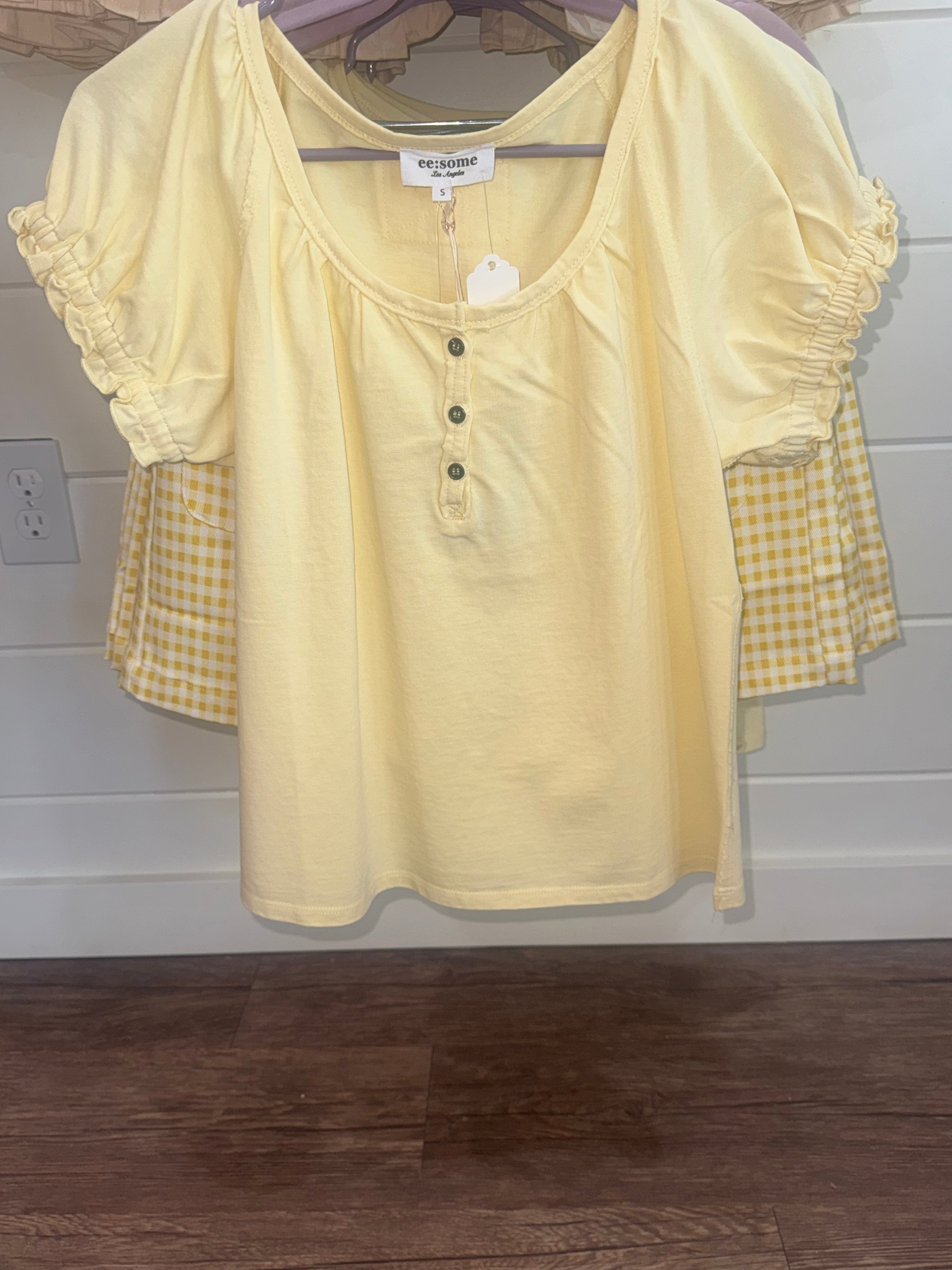 ee:some yellow shirt ruffled sleeves short sleeve